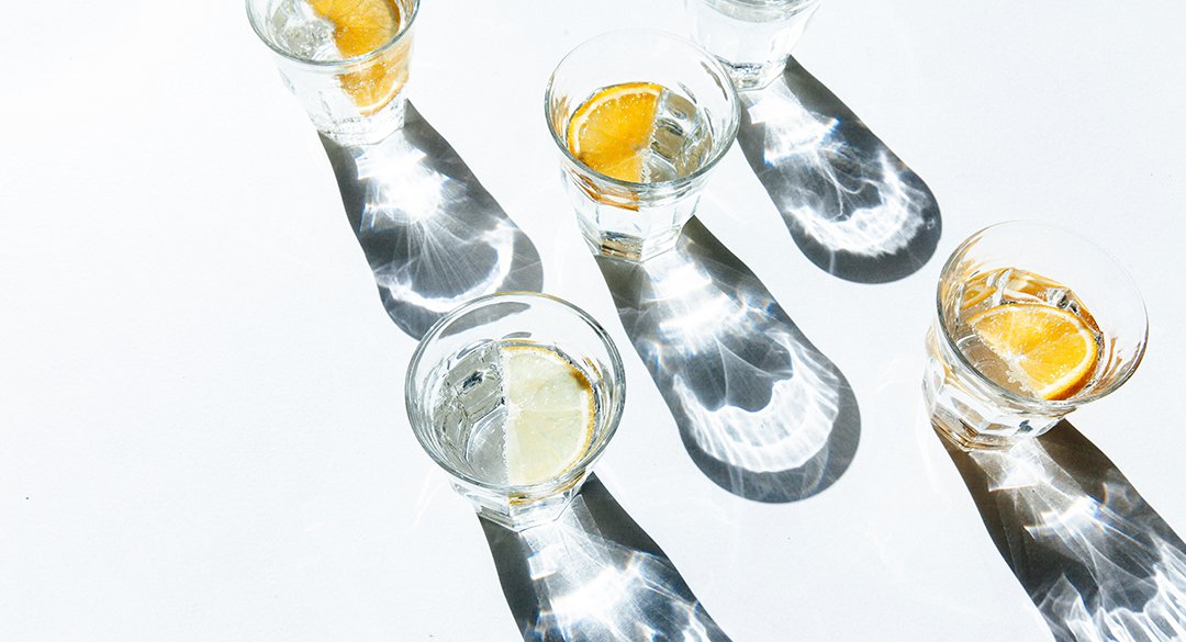 Glasses of water with lemon slices