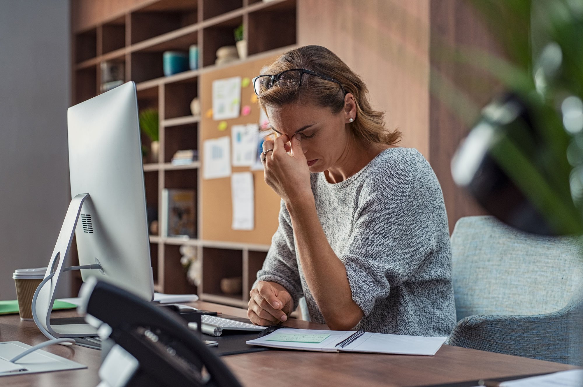 woman-stressed-at-desk.jpg